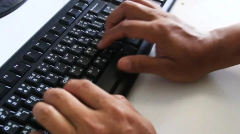 Man to typing computer keyboard Stock Footage 39195595