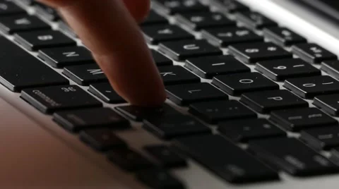 Man typing on computer keyboard Stock Footage 51116951