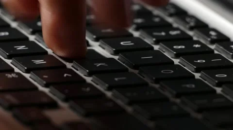 Man typing on computer keyboard Stock Footage 51120241