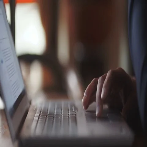 Man typing on computer keyboard Stock Footage 69454205