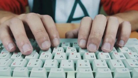 A man typing on a computer keyboard Stock Footage 70169638