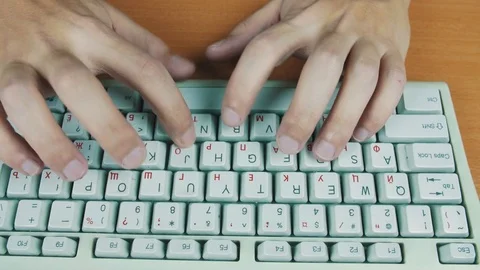 A man typing on a computer keyboard Stock Footage 70170101