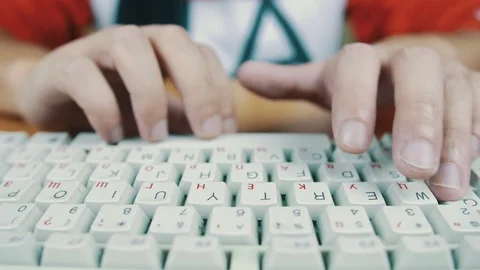 A man typing on a computer keyboard Stock Footage 70170283