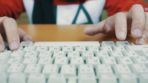 A man typing on a computer keyboard Stock Footage 70170678