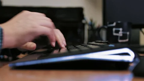 Man typing on computer keyboard Stock Footage 85401803