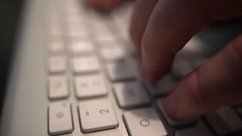 Man typing on the computer keyboard in the office Stock Footage 159468283