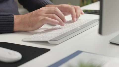 Man Typing on Computer Keyboard at Office Stock Footage 346810835