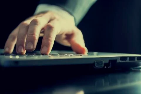 Man typing on a computer Foto stock