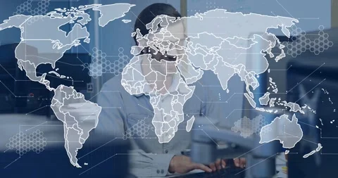 Man typing at desk starting animated map filling screens, showing borders hex Stock Footage 331270007