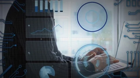 Man typing at desk by window causing UI overlays showing charts, HUD centering Stock Footage 335316857