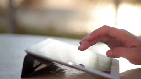 Man typing on a digital tablet Video stock 50184442