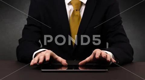 Man typing in formal clothing Stock Photos