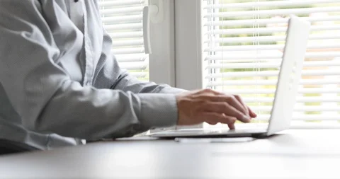 Man typing at his laptop computer and then frustrated Stock Footage 116748868