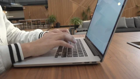 A man is typing on his laptop. Stock Footage 104888328
