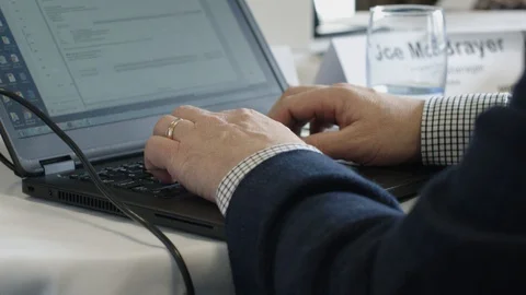 Man Typing On His Laptop Stock Footage 129398564