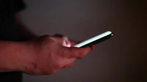 Man typing on his phone Stock Footage 169769795