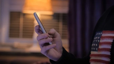 Man typing on his smartphone Stock Footage 98660866