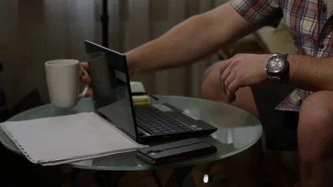 Man typing at home desk Stock Footage 72158137