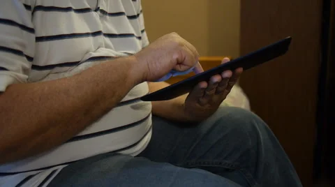 Man typing in Ipad-tablet 3 Stock Footage 41591706