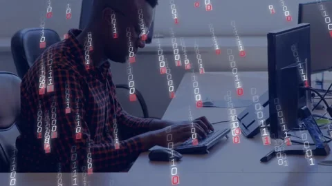 Man typing on keyboard and causing binary overlay growing across dual monitors Stock Footage 333154073