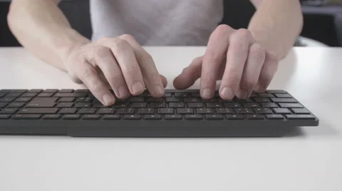Man typing on the keyboard and use the mouse Stock Footage 62724155