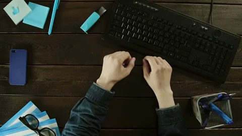 A man typing on the keyboard on the computer using one finger. Stock Footage 82001370