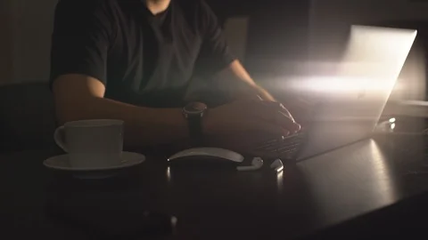 Man typing on the keyboard in the dark Stock Footage 92249455