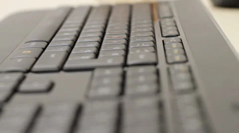 Man typing on keyboard 库存影片 33720795