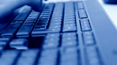 Man typing on keyboard 库存影片 33720819