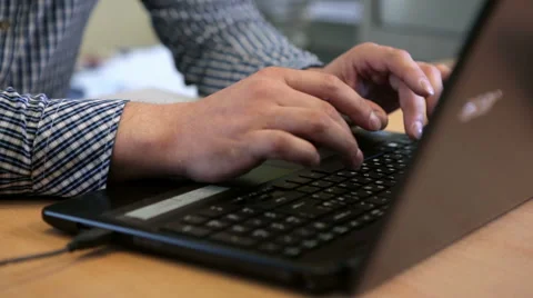A man typing on the keyboard  Stock Footage 45393057