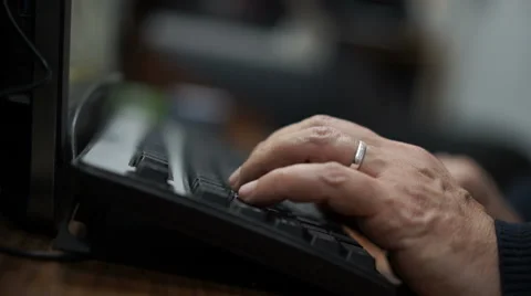Man typing on keyboard Stock Footage 58931352