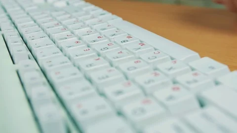 A man is typing on the keyboard Stock Footage 70169437