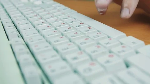 A man is typing on the keyboard Stock Footage 70169451