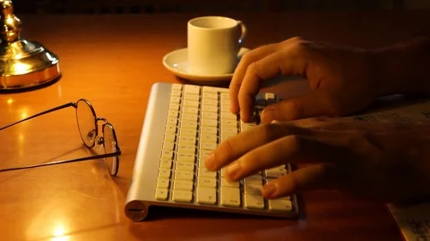 Man typing on keyboard Stock Footage 94380909