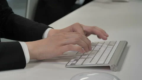 Man typing on keyboard Stock Footage 108390968