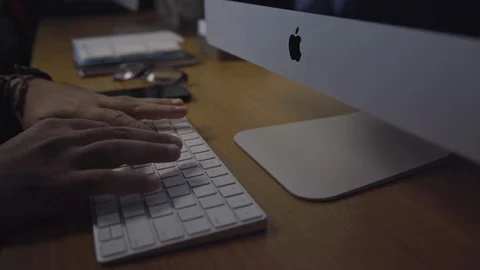 Man typing on keyboard Stock Footage 121560598