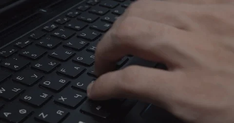Man is typing on the keyboard Stock Footage 125293303