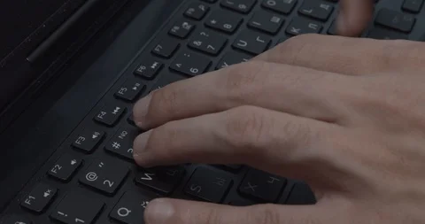 Man is typing on the keyboard Stock Footage 125293456
