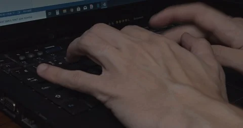Man is typing on the keyboard Stock Footage 125294288