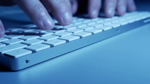 Man typing on a keyboard Stock Footage 126826736