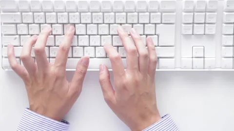 Man typing on a keyboard Stock Footage 158964120