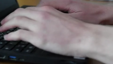 A man typing on a keyboard Stock Footage 240856908