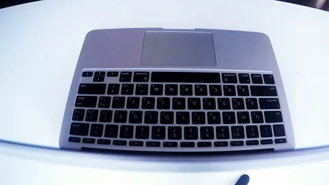 Man typing on keyboard, no visible logos/brands, daytime Stock Footage 85898032