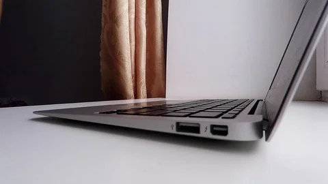 Man typing on keyboard, no visible logos/brands, daytime Stock Footage 85898218