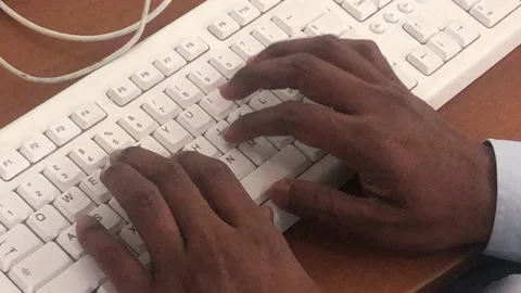 Man typing on keyboard in office  Stock Footage 134246714