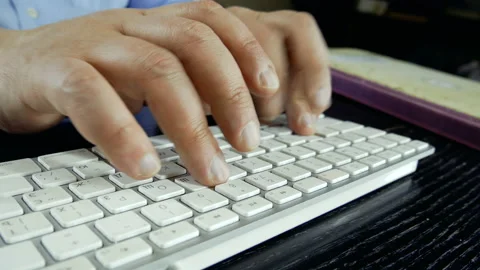 A man is typing on a keyboard. In the old room. Close-up. 스톡 동영상 130317495