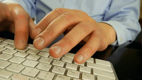 A man is typing on a keyboard. In the old room. Close-up. 스톡 동영상 130318385