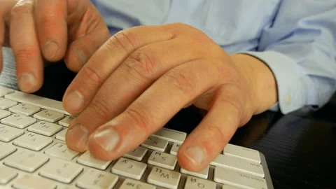 A man is typing on a keyboard. In the old room. Close-up. 스톡 동영상 130318403