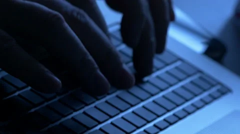 Man typing on keyboard, panning Stock Footage 45049482
