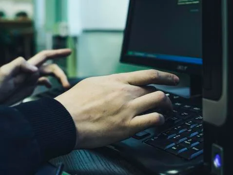 Man typing on the keyboard. Stock Photos